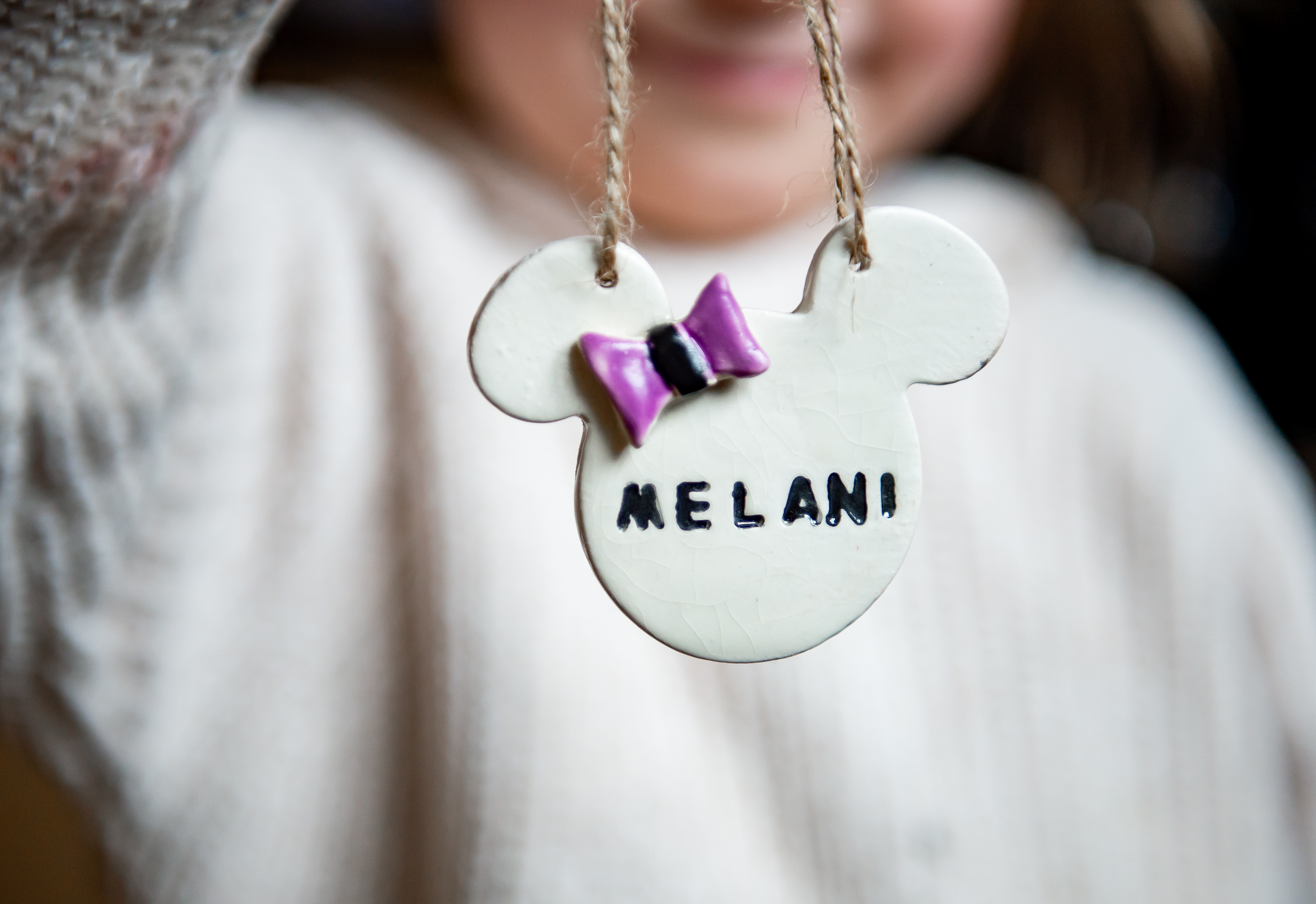 Bow-Topped Personalized Name Ornament ceramic piece
